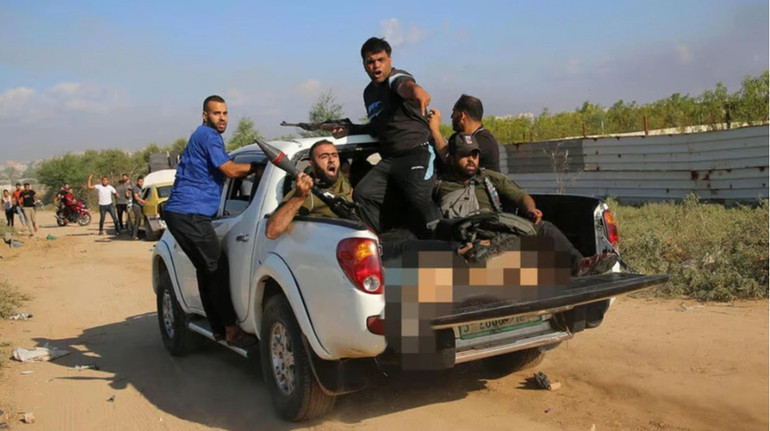 Associated Press відзначили за фото бойовиків ХАМАС, які везуть тіло вбитої жінки: у світі обурені