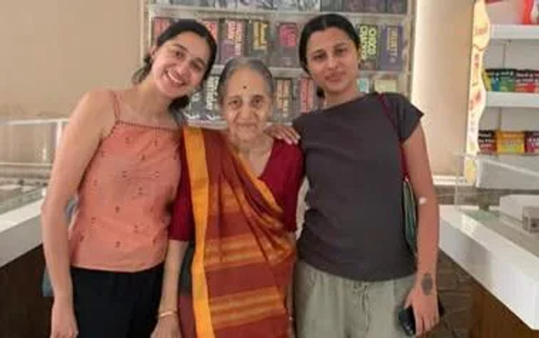 Sisters with grandmother in India
