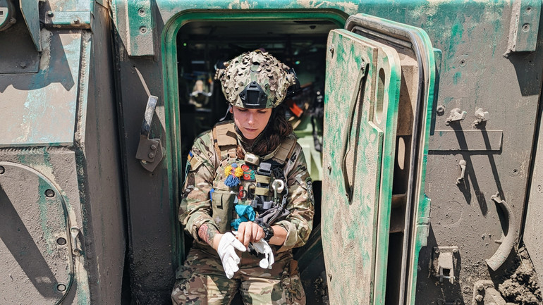 Tanya on an armored vehicle for evacuating the wounded