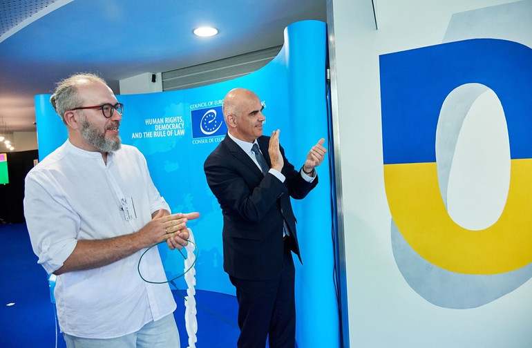 Роман Мінін та Ален Берсе