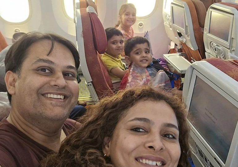 The family on board the aircraft