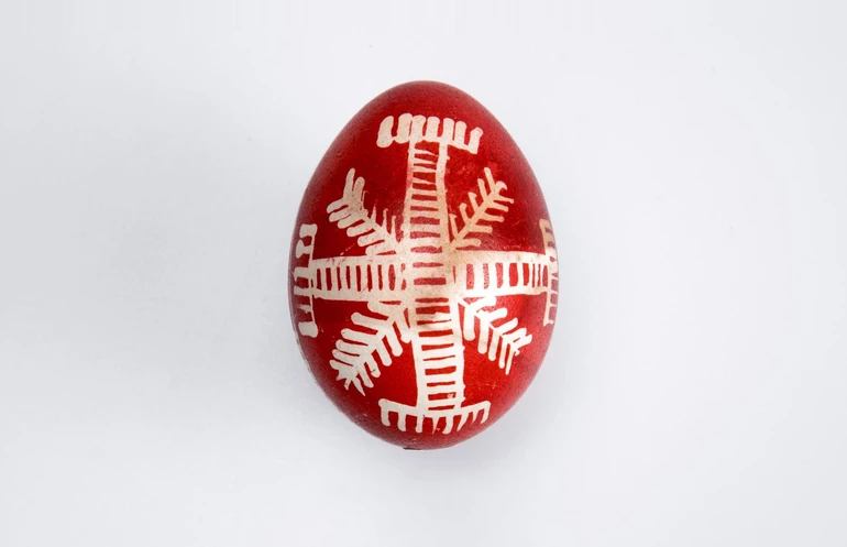 Писанка з грабельками, Опілля