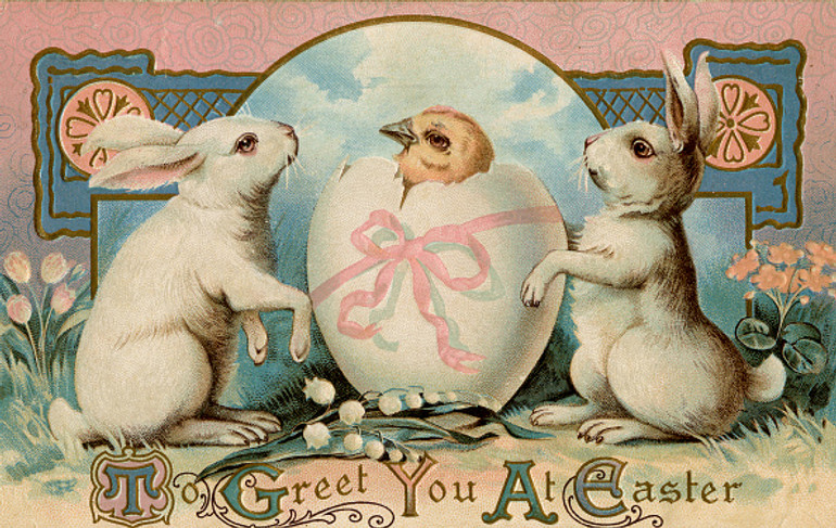 Великодні яйця і кролик на великодній листівці