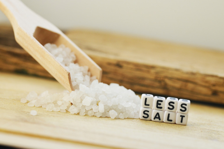 Eating too much salty food can contribute to the appearance of bags under the eyes.  Salt affects fluid retention in the body - the appearance of swelling.