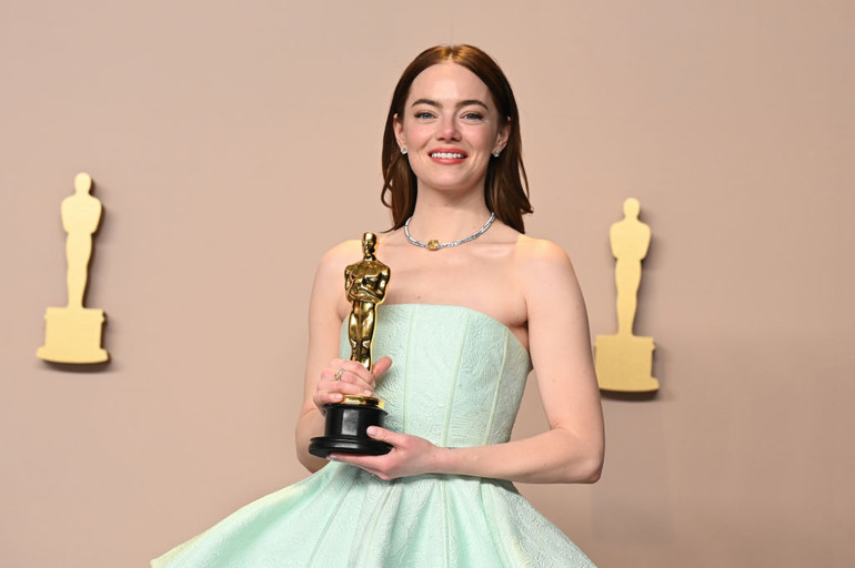 Emma Stone received a statuette as the Best Actress