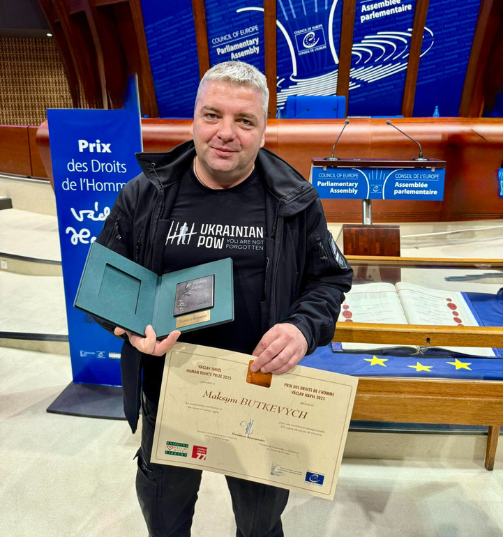 Maxim Butkevich with award