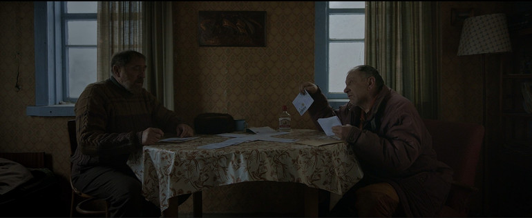 A frame from the movie Gray Bees