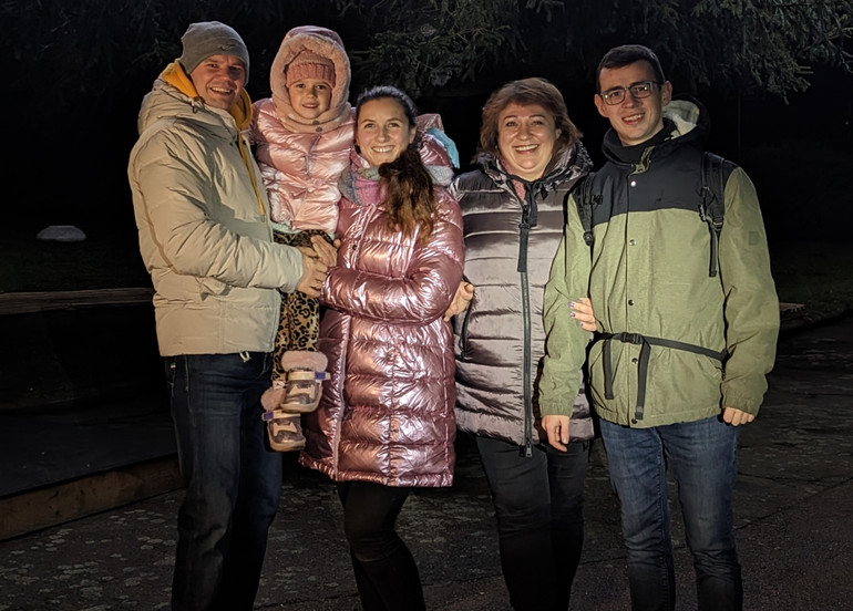 Maxim (right) with his family